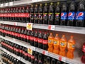 Klang, Malaysia - 10 July 2020 :ÃÂ Line or row of Carbonated Soft Drink bottles display for sell in the supermarket.